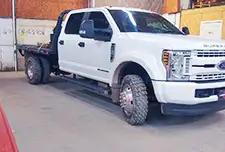 White service truck fitted with Founders tires